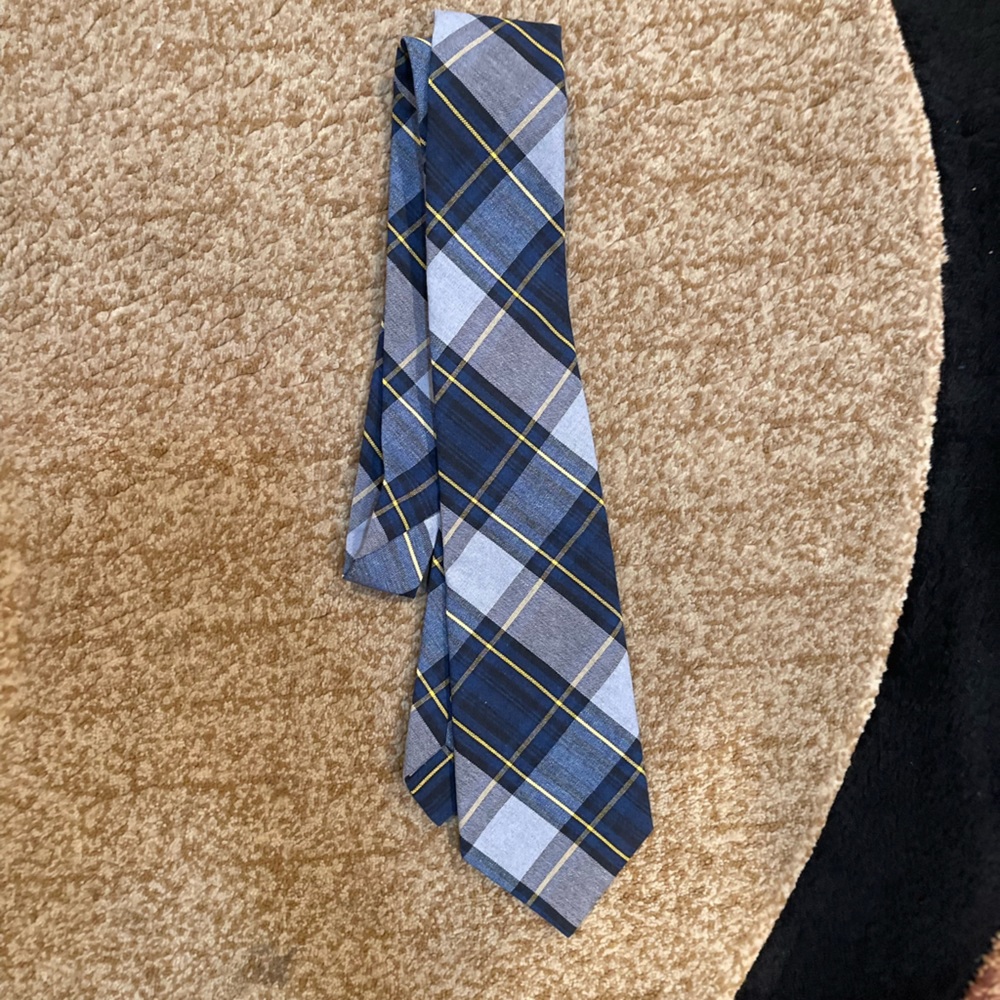 AFT tie blue black yellow and a light grey.